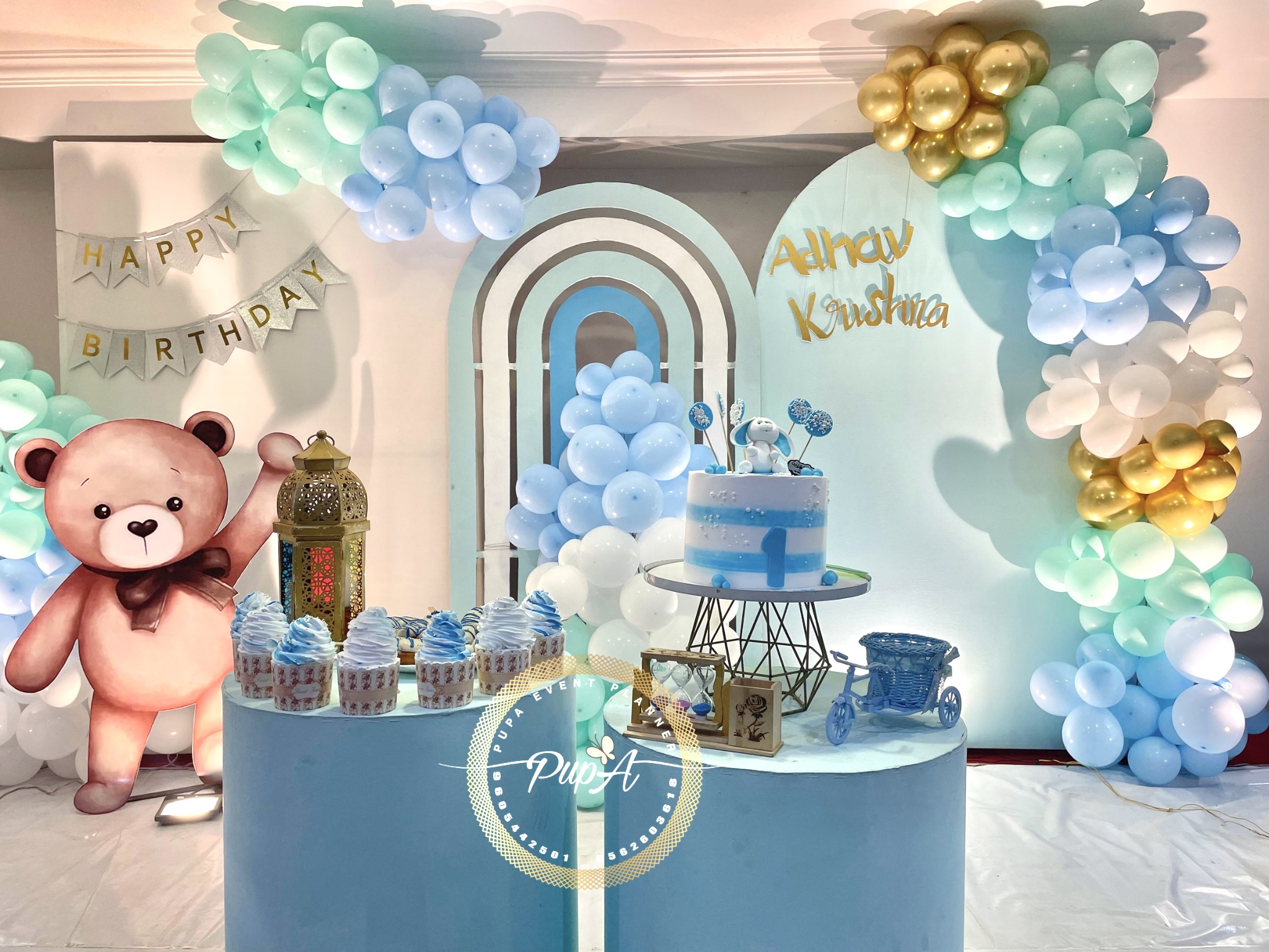 blue color themed decor for birthday by pupa event planner